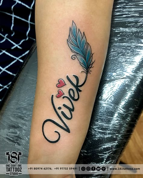 Cute Name Tattoo Name Tattoo With Feather, Feather And Name Tattoo, Vivek Name Tattoo, Name Tattoo Designs For Women, Vicky Name Tattoo, Name Tattoo With Design, Cute Name Tattoos, Name Tattoos For Girls, Heart Tattoos With Names