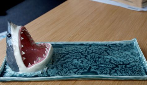 Sushi Shark Plate. The soy sauce goes in the shark's mouth. - someone buy this for me! Shark Plate, Shark Week Party, Shark Mouth, Sushi Plate, Mini Plate, Cute Shark, Chips And Salsa, Sea Inspired, The Shark