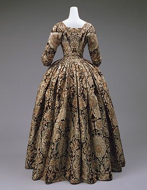 2-11-11
Dress, ca. 1735  British  Heavy silk with lace pattern design woven in beige and rust on a dark brown satin ground 1730s Fashion, 18th Century Dresses, 1700 Fashion, 18th Century Women, 18th Century Dress, Rococo Fashion, 18th Century Costume, 18th Century Clothing, Century Dress