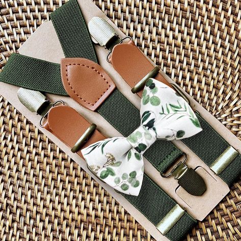 "This sage floral bow tie & vegan leather green suspender set is a great choice for family photos, groomsmen gift, weddings, ring bearer outfit, gift, birthday celebration or any other special occasion. ❤ **Please Specify**  Bow Tie Only (w/ Clip or Neck Strap), Suspenders Only, or Bow Tie Only & Susp (Bow Tie and Suspenders) SUSPENDERS- One Pair of our Quality Suspenders BOW TIE - One Bow Tie on White Adjustable STRAP or Alligator CLIP PET BOWTIE w/ Elastic Loops- Slips on a Dog/Cat/Pet Collar **CLIP ON Bow Ties are Recommended/Suitable for Children Only X-Small: 6 months- 2 years Small: 3 years- 5 years Medium: 6 years- 10 years Large: 10 years- Up To 6ft tall Adult: Adults Over 6ft Tall RUSH MY ORDER- Need you order ASAP? Simply add this to your cart before checkout: https://www.etsy.co Sage Green Ring Bearer Outfit, Sage Green And Sunflower Ring Bearer, Cottagecore Ring Bearer, Sage Suspenders Wedding, Sage Green Suspenders And Bowtie, Sage Green Bow Tie And Suspenders, Ring Bearer Ideas, Weddings Ring, Green Suspenders