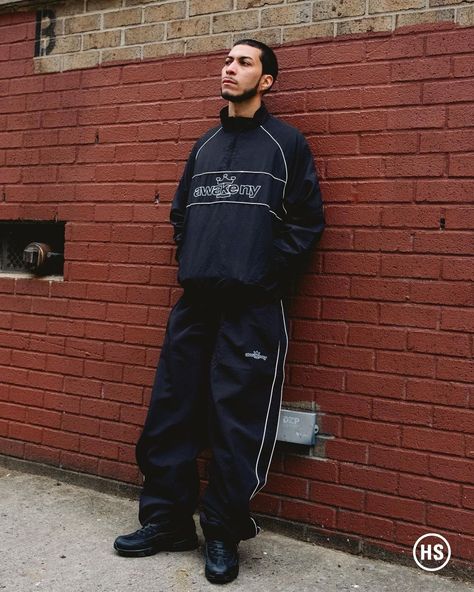 The latest selection from Awake NY is here, arriving straight from the Big Apple.⁠ ⁠ It features a vast range of products — including tight-fitting skully beanies, retro knit shirts, and baggy, graphic tracksuits — adorned with various takes on the label's signature branding.⁠ ⁠ To celebrate Angelo Baque’s brand being stocked at the Highsnobiety Shop for the first time, we asked our staff to select their favorite Awake NY product available now. Swipe left to see what they picked.⁠ ⁠ Hit the l... Sweatsuit Photoshoot Ideas, Baggy Tracksuit Outfit, Tracksuit Photoshoot, Baggy Tracksuit, School Tracksuit, Knit Shirts, Awake Ny, Boys Fits, Track Suits