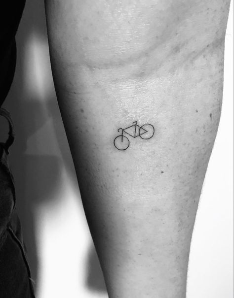 bicycle tattoo Mini Bike Tattoo, Cute Bike Tattoo, Dainty Bike Tattoo, Minimalist Bicycle Tattoo, Minimalist Cycling Tattoo, Tattoo Bicycle Ideas, Simple Bicycle Tattoo, Minimalist Bike Tattoo, Fine Line Bike Tattoo