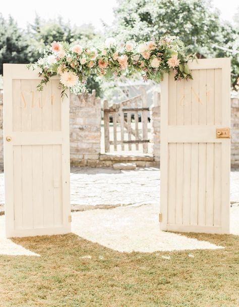 When it comes to wedding ideas and design in general, the things that always really get me are just… whimsical. The post office that sends out teeny tiny letters. Donut walls. Dogs in floral … Barn Door Wedding, Ceremony Backdrop Outdoor, Beautiful Venues, Wedding Doors, Barn Wedding Decorations, Rustic Outdoor Wedding, Floral Wedding Decorations, Wedding Arch Flowers, Romantic Garden Wedding