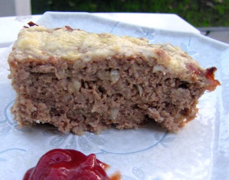 The recipe comes from the Sunset Ground Beef Cookbook 1968 and has been one of our all-time favorite meatloaf recipes because of the taste as well as how quickly everything is put together and baked. To up the taste I have included 1 clove of garlic minced. It's a very light textured meatloaf in a shallow pan instead of the typical loaf pan style. I am mostly putting this recipe here for safekeeping since my book is getting more and more stained after 4 decades of use. I normally eat this meat Tofu Meatloaf, Vegan Meatloaf Recipe, Cheese Meatloaf, Tartiflette Recipe, Cheese Stuffed Meatloaf, Vegan Meatloaf, Cottage Cheese Recipes, Steak Sauce, Meatloaf Recipes