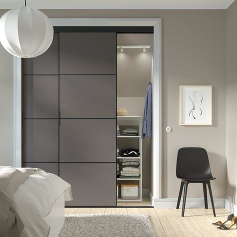 Save, create or even hide space with SKYTTA sliding doors. Hidden Spaces, Pax Wardrobe, Ikea Store, Sliding Door Systems, Integrated Handles, Door Frame, Sliding Door, Solid Pine, Kitchen Room