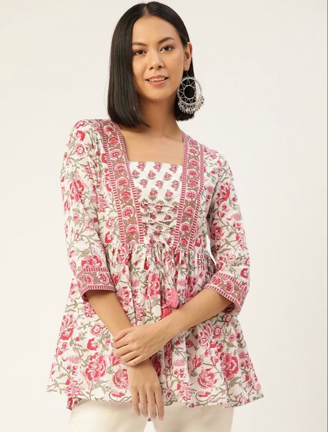 White & Pink Top with stylish Criss Cross Detailing in soothing Jaipuri Print Cotton Fabric makes it perfect for that stylish yet comfortable look! Available in 2 colors #jaipurPrint #jaipurTop #handblockPrint #cottontop #womensTop #cottonKurti #indianTop #indianKurti Pink Short Kurti, Short Kurtis For Women, Jaipuri Print, Sleeveless Blouse Designs, Churidar Designs, Saree Style, Short Kurti, Designer Blouse Patterns, Teenage Fashion