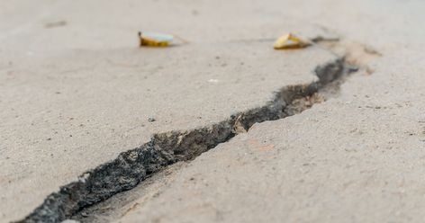 How to patch a cracked sidewalk or concrete patio | The Seattle Times How To Fix Cracked Concrete Patio, Patching Concrete Patio, Fix Uneven Concrete Patio, Cracked Concrete Patio Makeover, Cracked Sidewalk, Fix Cracked Concrete, Patio Repair, Concrete Sidewalk, Diy Concrete Patio