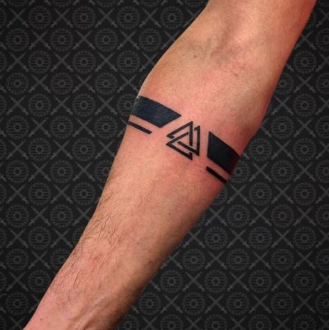 Searching for trendy and unique Viking tattoo ideas for men? Everything you need in our article: 53 interesting ideas, their meanings, and much more! Wrist Band Tattoos, Small Tattoos For Boys, Arm Band Tattoos For Men, Boys Hand Tattoo, Small Wrist Tattoos For Guys, Viking Tattoos For Men, Wrist Band Tattoo, Small Symbol Tattoos, Band Tattoos For Men