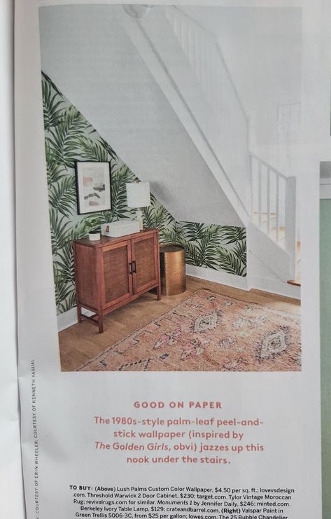 Under stairs nook from Real Simple. Palm print wallpaper with Threshold Warwick 2 door cabinet. Wallpaper Under Staircase, Wallpaper Under Stairs, Under Stairs Wallpaper, Staircase Banister Ideas, Stairs Nook, Banister Ideas, Staircase Wallpaper, Palm Print Wallpaper, Under Stairs Nook