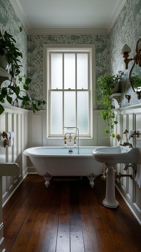 Discover tranquility in this elegant bathroom featuring a vintage clawfoot tub, floral wallpaper, and lush greenery. Perfect for relaxation and rejuvenation. #BathroomDesign #HomeDecor #VintageStyle Tiny Bathroom Clawfoot Tub, Clawfoot Tub Bathroom Farmhouse Style, Clawfoot Tub Bathroom Vintage, Clawfoot Tub Shower Combo, Clawfoot Tub Shower Curtain, Bathroom With Clawfoot Tub, Black Clawfoot Tub, Clawfoot Tub Bathroom, Vintage Clawfoot Tub