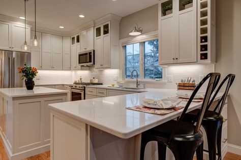 Kitchen remodel with peninsula for seating and island for prepping. Wine storage cubes and glass insert accents. Peninsula Island Kitchen, Kitchen With Island And Peninsula, Kitchen Peninsula And Island, Kitchen Peninsula With Seating, Peninsula With Seating, Peninsula Kitchen Layout, Small Kitchens With Peninsulas, Peninsula Island, Peninsula Kitchen Design