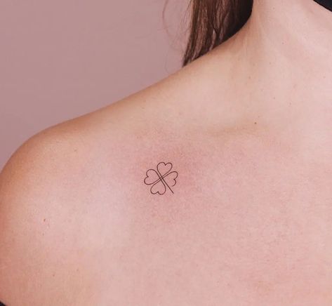 Four-leaf Clover Tattoos: What They Mean & Why They're So Popular Red Four Leaf Clover Tattoo, Clover Tatoos Four Leaf, Four Leaf Clover Heart Tattoo, Tattoo Cloverleaf, Four Leaf Clover Finger Tattoo, 4 Leaf Clover Tattoos, 4 Leaves Clover Tattoo, Leaf Clover Tattoo, Four Left Clover Tattoo