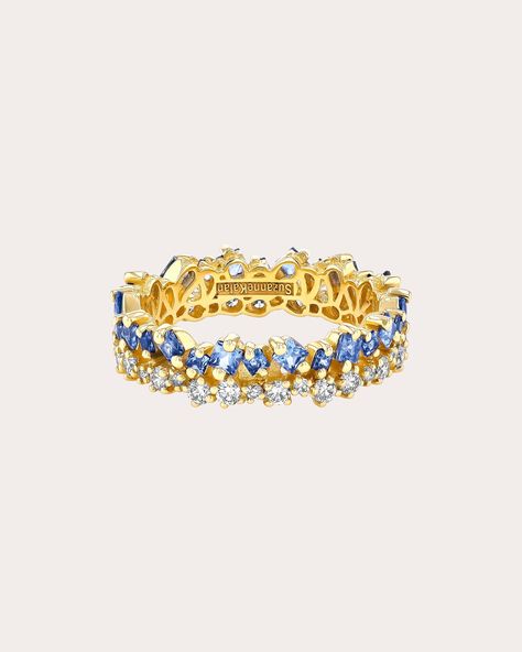 A modern twist on classic eternity bands, this Suzanne Kalan ring displays princess-cut sapphires atop a row of unevenly set diamonds to create a stacked appearance. The solid 18-karat gold construction reflects heirloom quality. 18k yellow gold, light blue sapphire and white diamond Carat: 0.6 ctw diamond, 1.25 ctw sapphire Diamond color: G Diamond clarity: VS Polish with soft cloth Handmade in the USA Measurements Width: 5.25mm Sapphire Eternity Band, Short Stack, Light Blue Sapphire, Suzanne Kalan, Ring Displays, Birthday List, Gold Light, Diamond Carat, Eternity Band Diamond