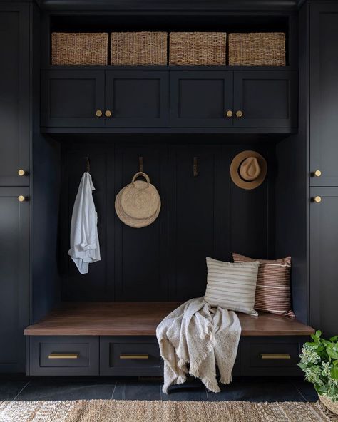 Mudroom | Design by Natalia Avalos Interiors | Spring has sprung and what better way to start the season than by decluttering your space? Boxes and baskets keep scattered items tucked away while providing storage and style! 🌼🌷🧺 Happy #SpringCleaning Black And Wood Mudroom, Witching Hour Benjamin Moore, Entryway With Bench, Black Mudroom, Entrance Storage, Small Mudroom, Small Mudroom Ideas, Entry Cabinet, Mudroom Remodel