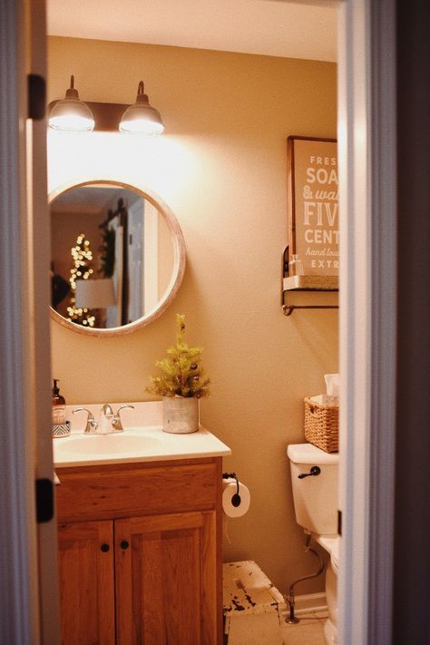 Natural Wood Trim Bathroom, Orange Cabinets Bathroom, Bathroom Tan Walls, Honey Oak Bathroom, Bathroom Tan, Tan Bathroom, Orange Cabinets, Small Half Bathrooms, Oak Bathroom Cabinets