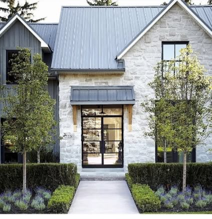 White House With Rock Accents, Heavy Mortar Stone Exterior, White Stone Exterior House Modern, Napa Farmhouse Exterior, White Stone On House Exterior, Limestone Cottage Exterior, Stone House Metal Roof, Adding Rock To House Exterior, Stone Half Way Up Exterior