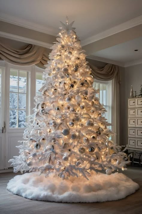 30 Cutest White Christmas Tree Ideas White Tree With Silver Ornaments, Decorate White Christmas Tree, Decorating White Christmas Trees, Small White Christmas Tree Ideas, How To Decorate A White Christmas Tree, White And Silver Christmas Tree Ideas, White Christmas Trees Decorated, Christmas Tree Ideas Classy, All White Christmas Tree