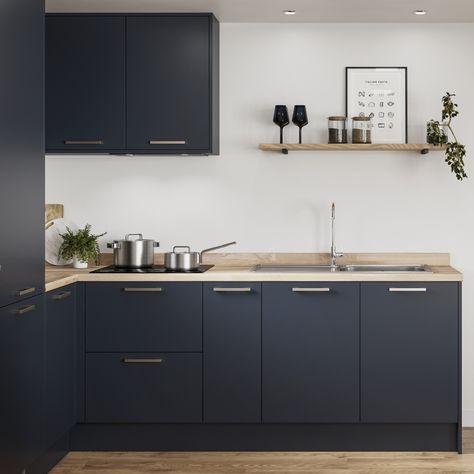 Embrace the trend for dark interiors with the bold shade of our Greenwich Navy kitchen cabinets. To create this bold kitchen design then pair with wood flooring for kitchen flooring ideas. With a slab design and matt finish the Greenwich range is perfect for a modern space. Matte Blue Kitchen Cabinets, Navy And Wood Kitchen, Annexe Ideas, Flat Panel Kitchen Cabinets, Slab Kitchen Cabinets, Forest Crown, Navy Kitchen Cabinets, Flooring For Kitchen, Kate Hutchins