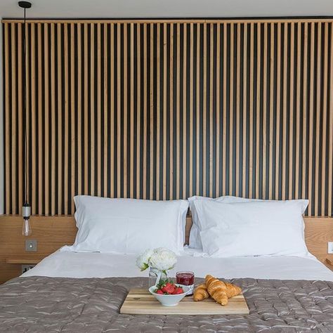 Transform your home with bespoke furniture design✨​ Here we designed, crafted and installed this stunning bespoke headboard which runs the entire width of the room to complete the contemporary vibe of this @boutiqueholidaylets apartment.  #bedroomdesign #bedroomdecor #headboard #headboardinspiration #headboardinspo #bedroominspo #homedecor   #Regram via @CBjA0ZrjMe6 Modern Log House, Acoustic Wood Wall Panels, Wood Wall Panels, غرفة ملابس, Bed In Closet, Wood Panel Walls, Log Homes, Wall Panels, 인테리어 디자인