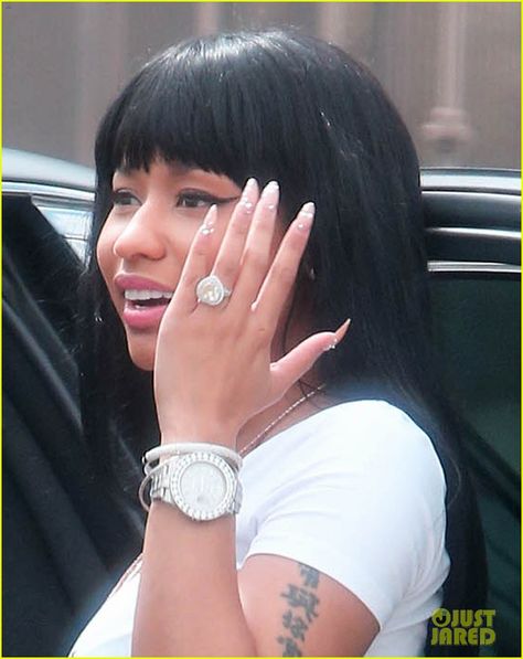 nicki minaj engagement ring finger 23 Nicki Minaj smiles for the cameras while getting into her car as she runs errands on Wednesday afternoon (September 16) in Beverly Hills, Calif.    The 32-year-old… Micki Minaj, Nicki Baby, Huge Diamond Rings, Engagement Rings On Finger, Nicki Minaj Barbie, Nicki Minaj Photos, Nicki Minaj Pictures, Meek Mill, Female Rappers