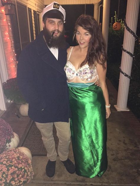 homemade Mermaid and captain costume                                                                                                                                                                                 More Sea Captain Costume, Adult Princess Costume, Homemade Mermaid Costumes, Native American Halloween Costume, Captain Costume, Princess Jasmine Costume, Funny Couple Halloween Costumes, Girl Group Costumes, Pirate Halloween Costumes