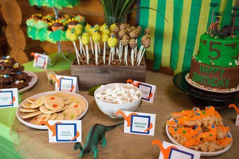 Sweets table from a Dinosaur 5th Birthday Party via Kara's Party Ideas | karaspartyideas.com Dinosaur Sweets, Dinosaur 5th Birthday Party, Cricut Party Decorations, Dino Party Food, Baby Dinosaur Party, Dinosaurs Birthday Party, Dinosaurs Birthday, Dinosaur Party Decorations, Treat Table