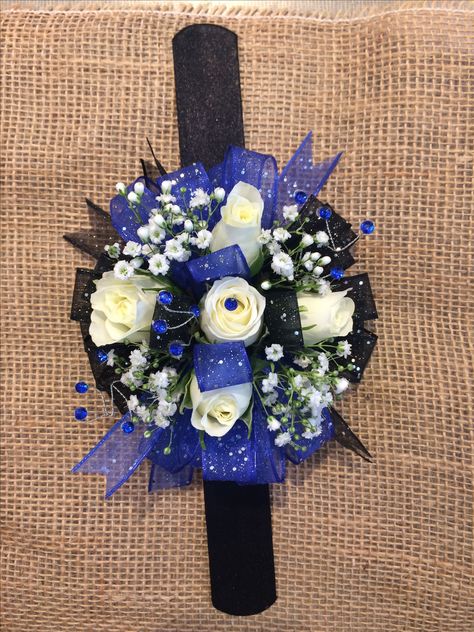 Royal blue and black sparkle ribbon with blue jewels and white spray rose corsage Hoco Corsage, Spray Rose Corsage, White Spray Rose, Black Corsage, Wrist Corsage Prom, Homecoming Corsage, White Spray Roses, Rose Corsage, Corsage Prom