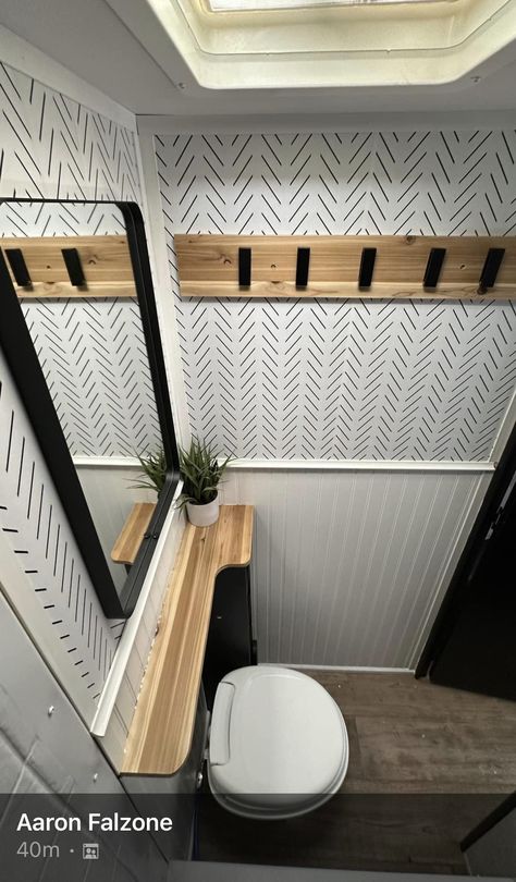 Camper Bathroom Wallpaper, Easy Diy Camper Remodel, Black And White Rv Remodel, Remodeled Camper Bathroom, Camper Set Up Ideas Outside, Fifth Wheel Toy Hauler Remodel, 5th Wheel Bathroom Remodel, Toy Hauler Camper Remodel, Redone Campers Interiors