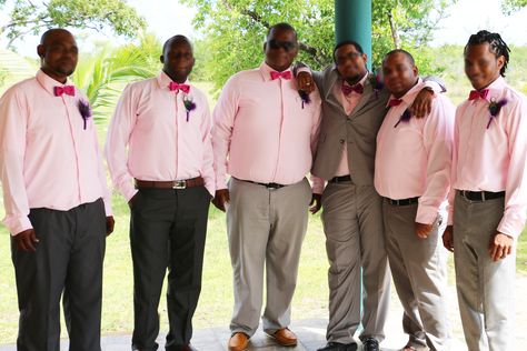 Men of the bridal party wearing plush pink dress shirts and grey slacks with bright fucshia bow ties complimenting the groom in his light grey suit and magenta bowtie Light Grey Suit, Light Grey Suits, Grey Slacks, Pink Peacock, Peacock Wedding, Grey Suit, Gray Suit, The Groom, Bow Ties