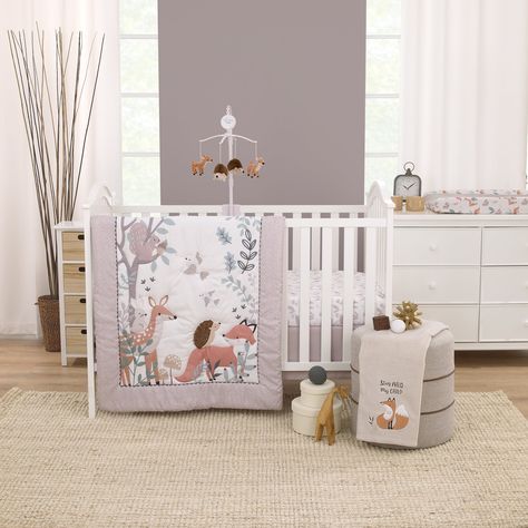 The Little Love by NoJo Woodland Meadow 3 Piece Crib Bedding Set includes a comforter, fitted crib sheet, and crib skirt. The comforter features a sweet forest scene with birds flying about and a deer, fox, hedgehog, bunny, and squirrel down below. All in soft shades of taupe, tan, sage and white. Measures 33" x 42", perfect for tummy time! The matching crib sheet is a fun allover pattern of forest friends in colors of taupe and white. Measures 28" x 52" and has full elastic edges for a safe and snug fit. The crib skirt has a 14" drop length and is designed in solid taupe. Fits a standard size crib mattress. All made with super soft fabrics. Coordinates with a f  3-Piece Nursery Crib Bedding Set includes Comforter, Fitted Crib Sheet, and Crib Skirt Features fun forest friends in soft shade Deer Themed Nursery, Woodland Meadow, Mini Crib Bedding, Woodland Nursery Girl, Kids Comforters, Baby Crib Bedding Sets, Mini Crib Sheets, Baby Crib Bedding, Crib Bedding Set