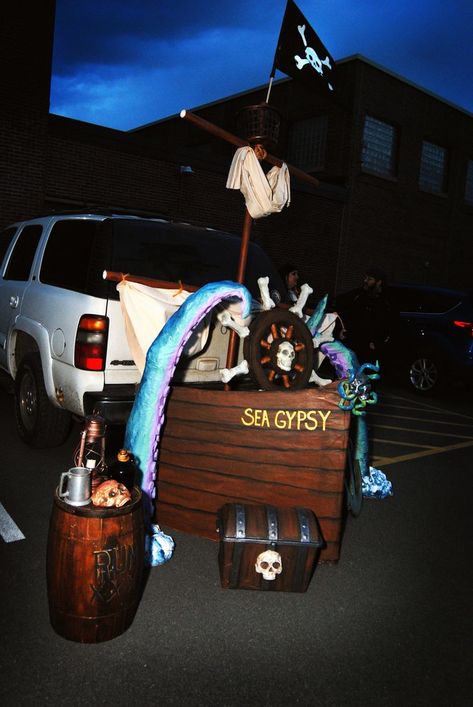 Our 2021 Trunk or Treat display! This years theme Pirates! Release the KRAKEN! Kraken Trunk Or Treat, Pirate Boat Trunk Or Treat, Trunk Or Treat Ideas For Trucks Pirate, Trunk Or Treat Pirates Of The Caribbean, Halloween Trunks Ideas, Pirate Trunk Or Treat, The Kraken, Trunk Or Treat, Kraken