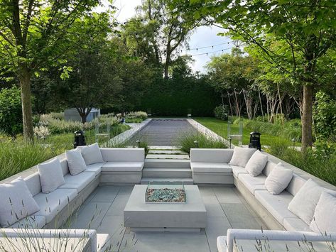 Ed Hollander on Instagram: “Evening entertainment area with sunken fire pit, bocci and bar #hollanderdesign #evening #fun #landscape #firepit #landscapedesign…” Sunken Pit Outdoor, Square Sunken Fire Pit With Seating, Built In Fire Pit Seating, Backyard Sitting Area With Fire Pit, Sunken Fire Pits With Seating, Sunk In Fire Pit, Sunken Patio Ideas, Sunken Seating Area Garden, Sunken Fire Pit With Seating