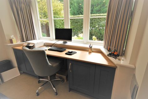 A simple desk solution designed to fit inside clients bay window. Made using our Taransey smooth painted doors in Farrow & Ball 'Stiffkey Blue' and a 25mm pp edged Oak laminate worktop. #office #desk #study #painted #blue #oak #design Bay Window Desk Ideas, Bay Window Office, Bay Window Desk, Bay Window Bedroom, Window Desk, Bay Window Living Room, Bedroom Workspace, Home Office Layouts, Basement Office