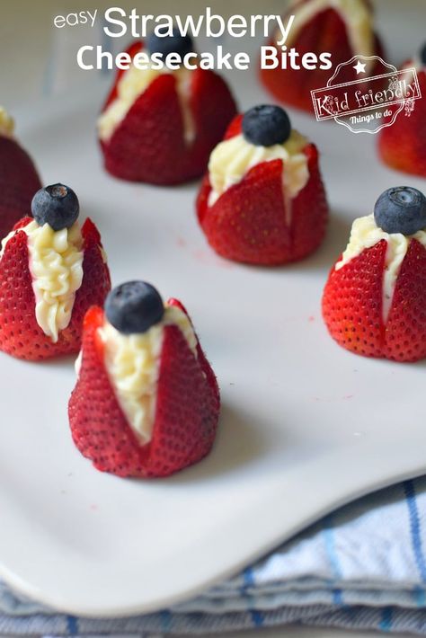 These No-Bake Strawberry Cheesecake Bites are the perfect finger food dessert. Decorate them with a blueberry for a fun patriotic or fun summer treat. www.kidfriendlythingstodo.com #strawberry #cheesecake #bites #recipe #fun #easy #treat #patriotic #dessert #fingerfood Finger Food Dessert, Strawberry Bites, Cookie Milkshake, Finger Food Desserts, Finger Desserts, Chicken Casserole Dinners, Finger Foods For Kids, Strawberry Shortcake Cheesecake, Strawberry Cheesecake Bites