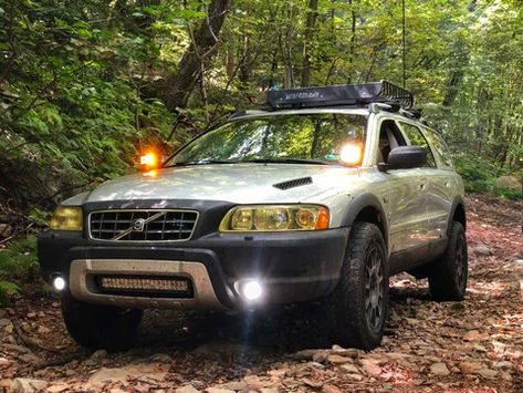 The Garage | Cross Country Performance Volvo Xc70 Cross Country, Volvo Logo, Hood Vents, Volvo Wagon, Volvo Xc, Country Lighting, Tractor Trailer Truck, Volvo Xc70, Silver Car