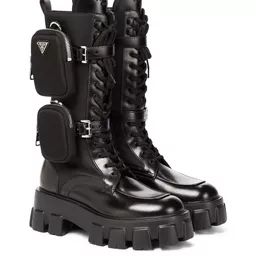 Monolith leather knee-high boots | Mytheresa (UK) Prada Boots With Pouch, Prada Monolith Boots Outfit, Prada Monolith Boots, Prada Monolith, Prada Boots, Menswear Runway, Black Platform Boots, Knee High Leather Boots, Boots Knee