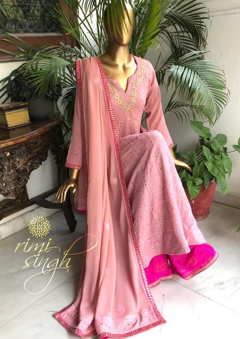 "Happiness is a choice. You can choose to be happy. There's going to be stress in life, but it's your choice whether you let it affect you or not." Watermelon pink pure georgette anarkali with chikenkari and mukaish work paired with a matching dupatta and magenta georgette bandhani print pallazo. There is gota patti hand embroidery on the neckline , edge of the sleeves , palazzo ghera and four sides of the dupatta. Available exclusively at Rimi Singh Studio A 999 Sushant Lok 1 Gurgaon #981 Mukaish Work, Indian Luxury, Bandhani Print, Georgette Anarkali, Indian Sari Dress, Lengha Choli, Night Gowns, Sari Dress, Kurti Set