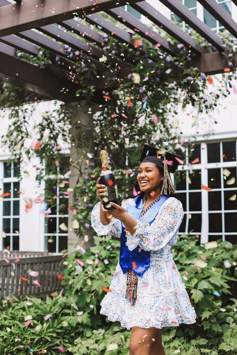 Person in white dress popping champagne bottle filled with confetti Grad Photo Champagne, Confetti Graduation Pictures, Graduation Pictures Champagne Pop, Confetti Popper Graduation Pictures, Grad Picture Ideas Champagne, Graduation Champagne Picture, Graduation Poses Confetti, Grad Photos With Champagne, Photography Random