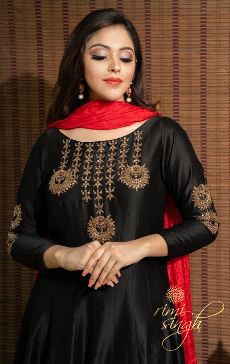 "ARSH" Festive Winter 2019  Picture Credit House Ocf  Black pure chanderi anarakali with zardosi hand embroidery on the bodice and sleeves paired with a red cotton silk palazzo pants and silk dupatta.  Available exclusively at  Rimi Singh Studio A 999 Sushant Lok 1  Gurgaon  #9818310054. Marodi Work, Silk Palazzo Pants, Indian Dresses For Kids, Ethnic Trends, Embroidery Suits Punjabi, Kurti Sleeves Design, Red Silk Dress, Indian Designer Suits, Hand Embroidery Dress