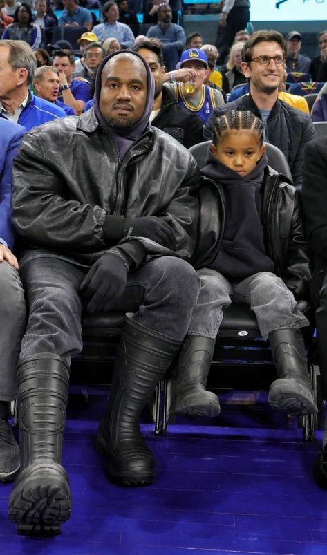 KANYE West looked serious while attending a basketball game with his six-year-old son Saint on Wednesday. The rapper, 44, had been banned from Instagram hours before the game for attacking Kim Kardashian and her boyfriend Pete Davidson in a series of nasty posts. And Kanye appeared to have the social media ban on his mind […] Warriors Vs Celtics, Kaney West, Celtics Game, Kanye West Outfits, Jenner Kids, Mens Rugged, Warriors Game, Pete Davidson, Kardashian Kids