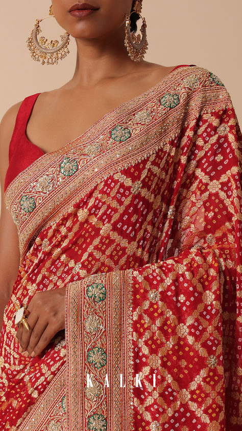 Transform your festive wardrobe with our exquisite Banarasi Khaddi Saree, a perfect blend of tradition and glamour. Crafted with intricate Bandhani weave and adorned with floral Zari cutdana work, this Georgette saree in captivating red is tailored for festive occasions. The Khaddi detailing adds a touch of sophistication, making it a timeless choice for women aged 30 to 50. The pack includes one saree and one unstitched blouse fabric, allowing you to customize your ensemble effortlessly. God Bharai, Cutdana Work, Pranali Rathod, Traditional Indian Dress, Radiant Red, Blouse Neck, Stylish Blouse Design, Designer Outfits, Boutique Dress Designs