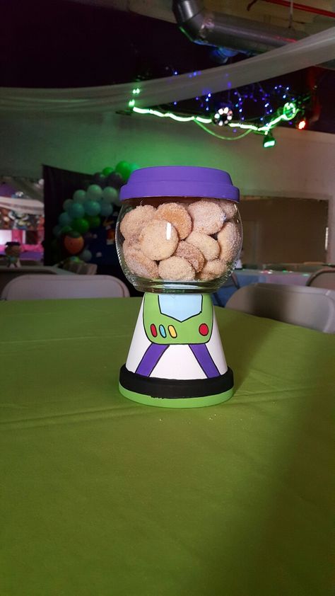 Buzz Lightyear Centerpieces Party Ideas, Buzz Lightyear Centerpieces, Buzz Lightyear Birthday Party Decor, Buzz Lightyear Party Decorations Diy, Woody And Buzz Centerpieces, Buzz Centerpiece, Neutral Buzz Lightyear Party, Two Year Old Buzz Lightyear Party, Centros De Mesa Toy Story Ideas