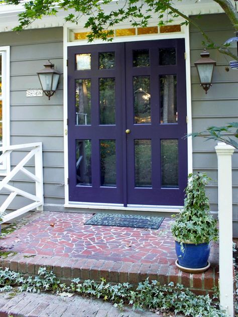 Check out DIYNetwork.com for paint colors and design ideas that will boost curb appeal and make your entry more inviting. Purple Front Door, Purple Front Doors, Best Front Door Colors, Shutter Colors, Best Front Doors, Front Door Paint Colors, Gray House, Purple Door, Door Paint Colors