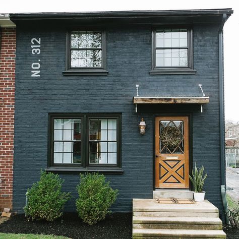 🔨Creative Space Designers 🎨 on Instagram: “Broad Street Exterior Transformation using "Polo Blue" by Benjamin Moore - gas lantern & black grid windows were the icing on the cake. I'm…” Black Brick House, Painted Brick Exteriors, Painted Brick House, Paint Your House, Home Exterior Makeover, Brick Exterior House, Black Brick, Exterior Makeover, Front Entrance