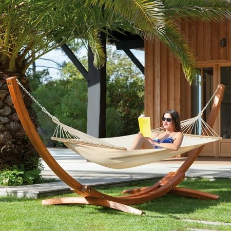 Do you still read a book just on the sofa at home? Do you still take a nap just on the lounge chair outdoors? AVAWING wooden hammock can satisfy you to enjoy a quiet leisure afternoon in your backyard or garden, whether it is in the shade of the tree, near the garden, backyard, or terrace. Relax, read a book, or just look at the clouds above your head. You can also use these wooden hammocks indoors as a permanent bed replacement for a deeper and more peaceful sleep. High Quality Hammock Large enough to accommodate 2 grown adults. Its designed to support up to 550 pounds. Made of polyester-cotton cloth that easily cleans up and dries quickly. Non-toxic fabric material, soft, breathable, and comfortable, weatherproof and oil proof, water resistant, and UV resistant. 14FT wood stand, the stur Indoor Hammock Bed, Cabin Patio, Wooden Hammock Stand, Wooden Hammock, Double Hammock With Stand, Hammock With Stand, Hammock Stands, Indoor Hammock, Outdoor Hammock