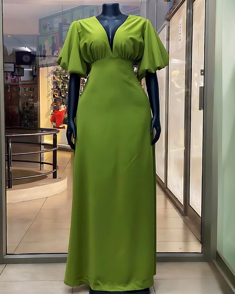 Taken 🫱🏽‍🫲🏾💚#madeinuganda 💚This vibrant green dress features a plunging V-neckline, puffed sleeves, and a flattering fit. The open back design with tie up straps adds a bold touch, while the flowing skirt creates an elegant silhouette…perfect for formal and casual occasions. #veevacouture Simple Gown Styles, Elegant Dresses Classy Modest, Casual Gown, Diy Maxi Dress, Casual Pieces, Simple Dress Casual, Chic Dressing, Nigerian Lace Styles Dress, Best Gowns