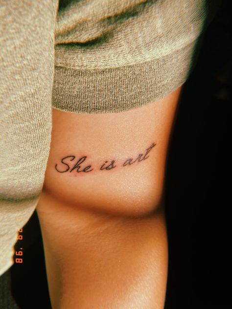 tattoo, she is art She Is Art Tattoo Black Women, One Word Arm Tattoos For Women, Tattoos Inside Arm Women, She Is Art Tattoo Font, Minimalistic Arm Tattoo, She Is Art Tattoo Ideas, Arm Crease Tattoo, Inside Arm Tattoo, She Is Art Tattoo