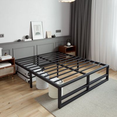 【Modern Design, Durability, and Comfort】Introducing our No Headboard Iron Bed with Black Painted Iron Bar and Cross Bed End. This bed frame is designed for modern minimalism and durability, offering a comfortable sleep experience. Constructed from high-quality iron, the bed frame is strong and sturdy, perfect for any bedroom. The absence of a headboard adds a modern touch, while the iron Bar and cross bed end provide a unique design element. The black paint finish gives the bed a sleek and moder Steel Bed Design Modern, Metal Bed Base, Industrial Bed Frame, Making A Bed Frame, No Headboard, Steel Bed Design, Low Profile Bed Frame, Black Bed Frame, Steel Bed Frame