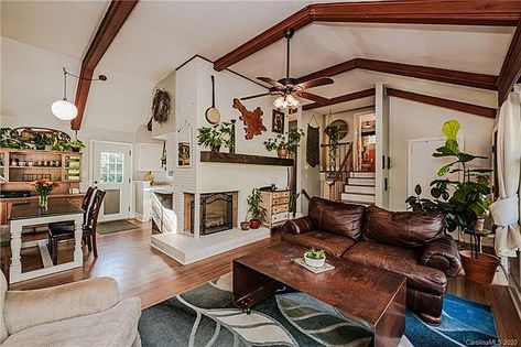 Split Level Bungalow, Living Room With Stove, Ceilings With Wood Beams, Split Level Living Room, Ceilings With Wood, Ceiling Beams Living Room, Beams Living Room, Owners Suite, Living Room Retro