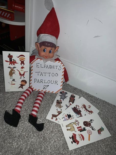 Cheeky Elf Ideas 2023 Elf On The Shelf Tattoo, Elf On The Shelf 2023, Elf Entrance Ideas, Snoop Dog Christmas, Elf On The Shelf Elaborate Ideas, Elf On The Shelf Tattoo Parlor, Elf On Shelf Funny, 2022 Elf On The Shelf Ideas, Elf On The Shelf Arrival Ideas 2022